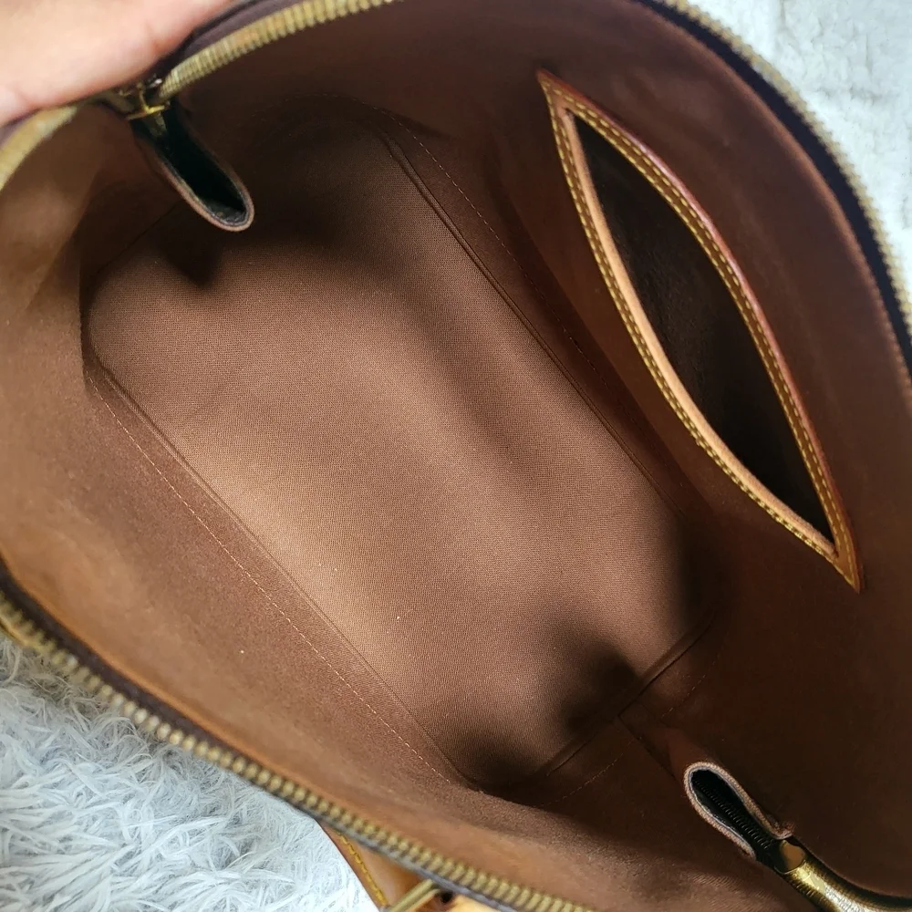 Authentic Louis Vuitton Monogram Alma PM Hand Bag..